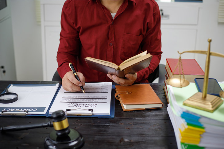 Lawyer conducting a complex investigation at Williamson Law Group office